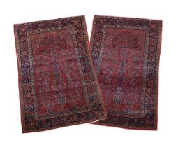 A PAIR OF KASHAN RUGS approximately 203 x 129 and 207 x 128cm respectively