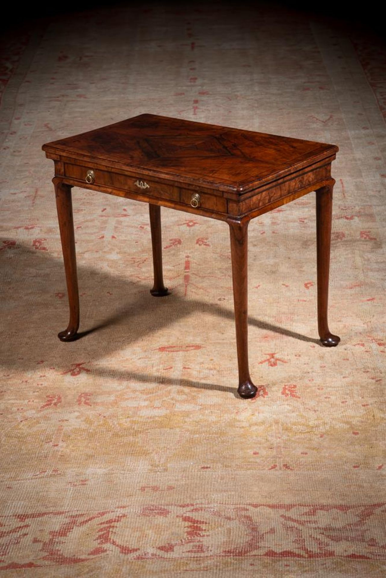 A FINE QUEEN ANNE FIGURED WALNUT SIDE TABLE, CIRCA 1710