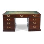 A GEORGE III MAHOGANY PARTNER'S DESK, CIRCA 1780