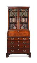 A GEORGE II MAHOGANY BUREAU BOOKCASE, BY JOHN FRANKLIN, CIRCA 1750