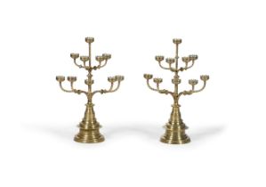 A PAIR OF ARTS AND CRAFTS GILT BRONZE SEVEN LIGHT CANDELABRA, LATE 19TH CENTURY