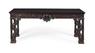 A LARGE CARVED MAHOGANY SERVING OR HALL TABLE, OF RECENT MANUFACTURE