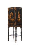 A REGENCY BLACK LACQUER AND GILT CHINOISERIE DECORATED COLLECTOR'S CABINET ON STAND