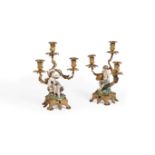 A PAIR OF ORMOLU MOUNTED MINTON PORCELAIN THREE LIGHT CANDELABRA EARLY 19TH CENTURY With Minton po