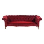 A VICTORIAN WALNUT AND BUTTONED UPHOLSTERED SOFA, BY HOWARD & SONS, LATE 19TH CENTURY
