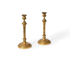 A PAIR OF LOUIS XVI ORMOLU CANDLESTICKS, LATE 18TH CENTURY