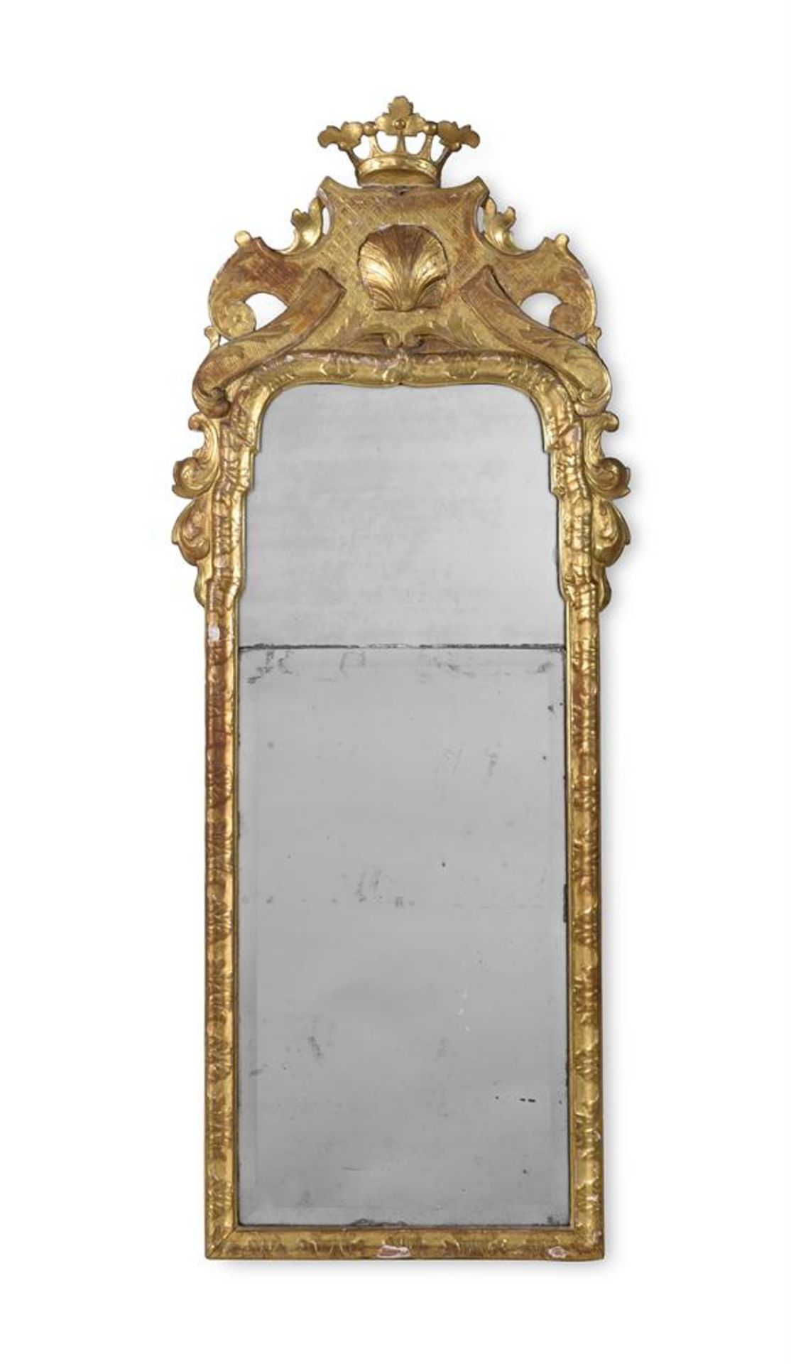 A GEORGE I CARVED GILTWOOD MIRROR, CIRCA 1725