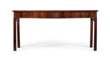A MAHOGANY AND FUSTIC MAHOGANY SERPENTINE FRONTED SERVING TABLE, FIRST HALF 19TH CENTURY
