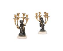 A PAIR OF FRENCH GILT AND PATINATED BRONZE FOUR LIGHT CANDELABRA LATE, 19TH CENTURY