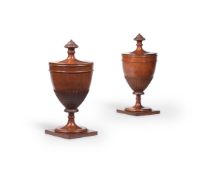 A PAIR OF MAHOGANY URNS AND COVERS, IN GEORGE III NEOCLASSICAL STYLE, 20TH CENTURY