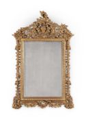 A CONTINENTAL CARVED GILTWOOD MIRROR, POSSIBLY ITALIAN, 19TH CENTURY