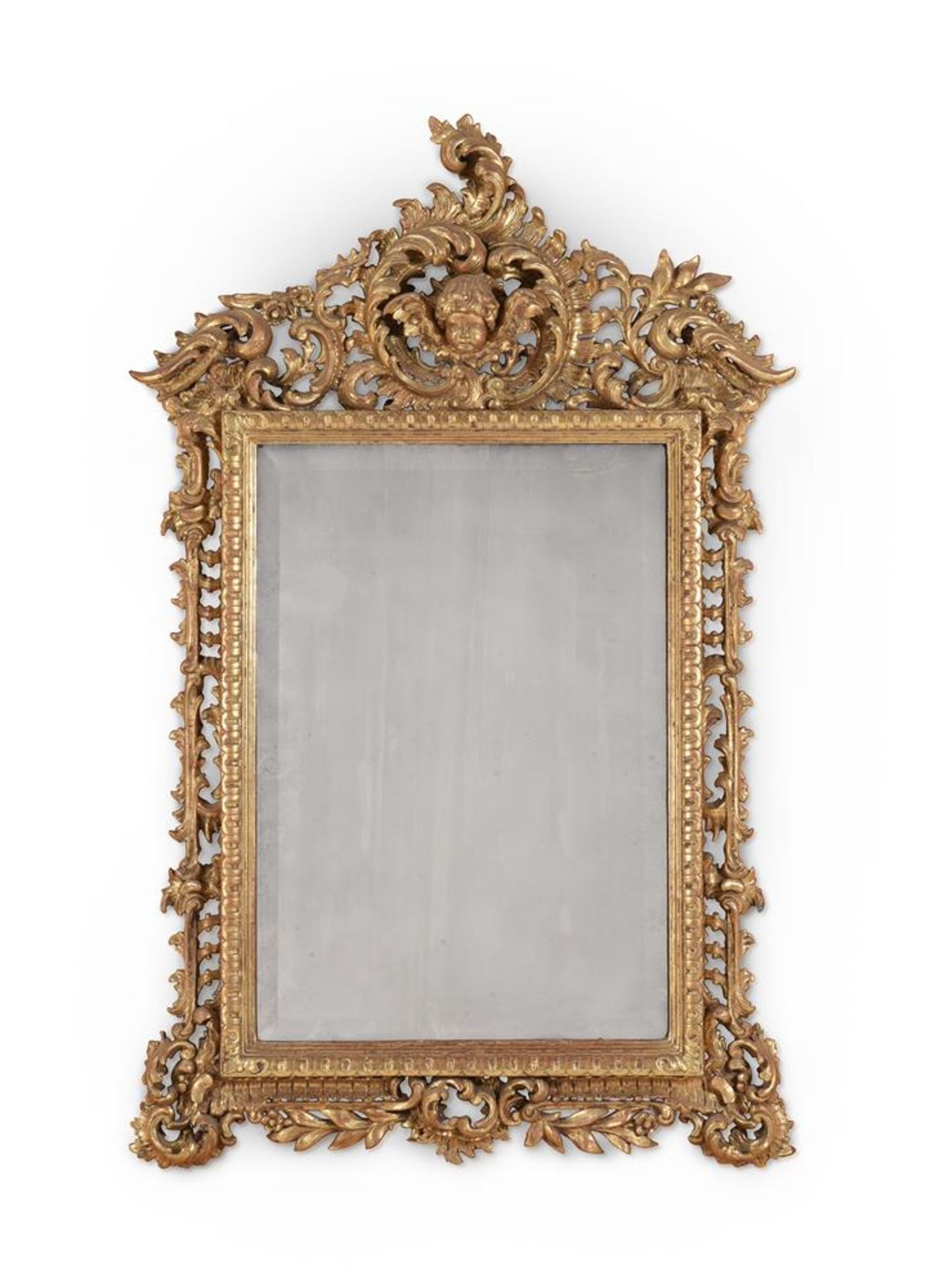 A CONTINENTAL CARVED GILTWOOD MIRROR, POSSIBLY ITALIAN, 19TH CENTURY
