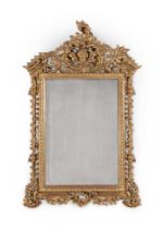 A CONTINENTAL CARVED GILTWOOD MIRROR, POSSIBLY ITALIAN, 19TH CENTURY