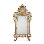 A LARGE NORTH ITALIAN CARVED GILTWOOD MIRROR, 19TH CENTURY