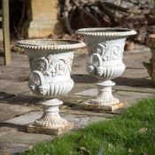 A PAIR OF CAST IRON CAMPANA URNS, ATTRIBUTED TO THE HANDYSIDE FOUNDRY, 19TH CENTURY