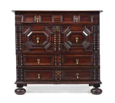 A CHARLES II OAK CHEST OF DRAWERS, CIRCA 1660