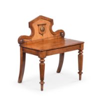 A GEORGE IV FIGURED OAK HALL SEAT, IN THE MANNER OF GILLOWS, CIRCA 1825