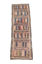 A NORTH WEST PERSIAN KILIM RUNNER, approximately 121 x 38cm