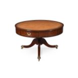 A GEORGE III MAHOGANY DRUM LIBRARY TABLE, CIRCA 1810