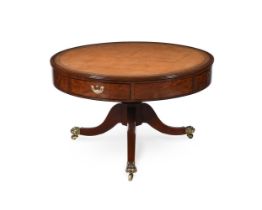 A GEORGE III MAHOGANY DRUM LIBRARY TABLE, CIRCA 1810