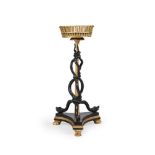 A REGENCY EBONISED AND PARCEL GILT TORCHERE OR STAND, AFTER DESIGNS BY ROBERT ADAM, CIRCA 1815