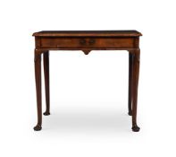 A GEORGE II WALNUT, CROSSBANDED AND FEATHERBANDED SIDE TABLE, CIRCA 1730
