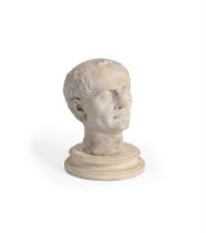 AFTER THE ANTIQUE, A CARVED MARBLE HEAD OF AN EMPEROR, PROBABLY ITALIAN, EARLY 19TH CENTURY