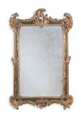 A CONTINENTAL CARVED GILTWOOD, GESSO AND PAINTED MIRROR, POSSIBLY VENETIAN, LATE 18TH CENTURY