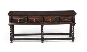 A CHARLES II OAK DRESSER BASE, CIRCA 1660