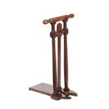 A GEORGE III MAHOGANY BOOT JACK, IN THE MANNER OF GILLOWS, CIRCA 1820