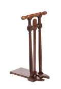 A GEORGE III MAHOGANY BOOT JACK, IN THE MANNER OF GILLOWS, CIRCA 1820