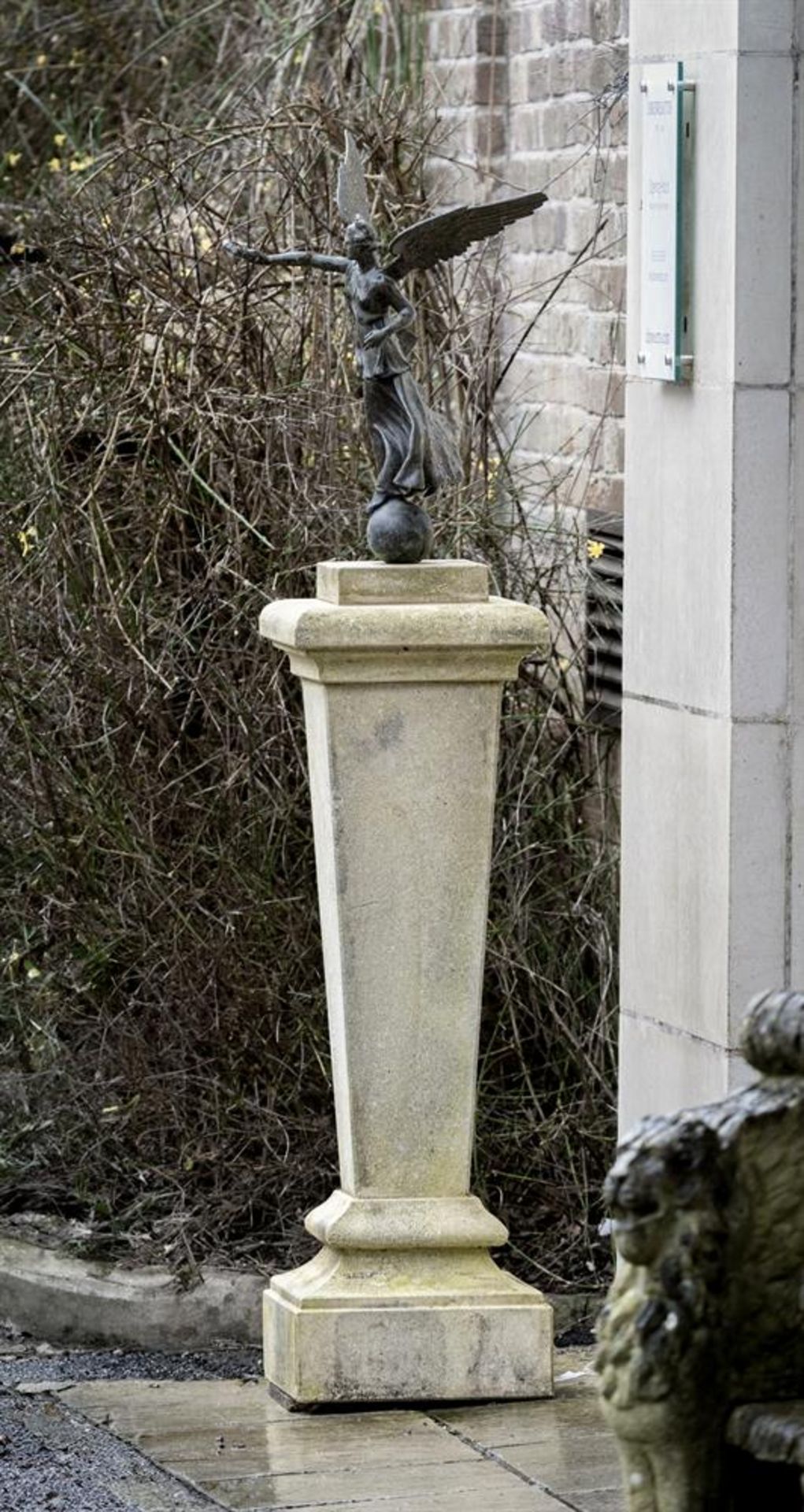 AFTER THE ANTIQUE, A BRONZE FIGURE OF NIKE ON A CARVED STONE PEDESTAL - Image 2 of 3