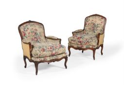 A MATCHED PAIR OF LOUIS XV BEECH AND TAPESTRY UPHOLSTERED ARMCHAIRS, BY JEAN BAPTISTE GOURDIN