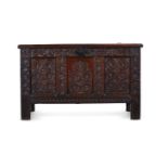 A CHARLES II CARVED OAK COFFER, CIRCA 1680