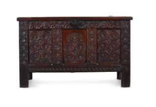 A CHARLES II CARVED OAK COFFER, CIRCA 1680