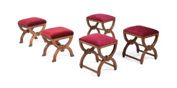 A GROUP OF FIVE VICTORIAN GOTHIC OAK TABOURET STOOLS, THIRD QUARTER 19TH CENTURY