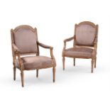A PAIR OF CARVED BEECH ARMCHAIRSIN LOUIS XVI STYLE, LATE 19TH OR EARLY 20TH CENTURY