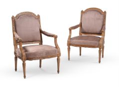 A PAIR OF CARVED BEECH ARMCHAIRSIN LOUIS XVI STYLE, LATE 19TH OR EARLY 20TH CENTURY
