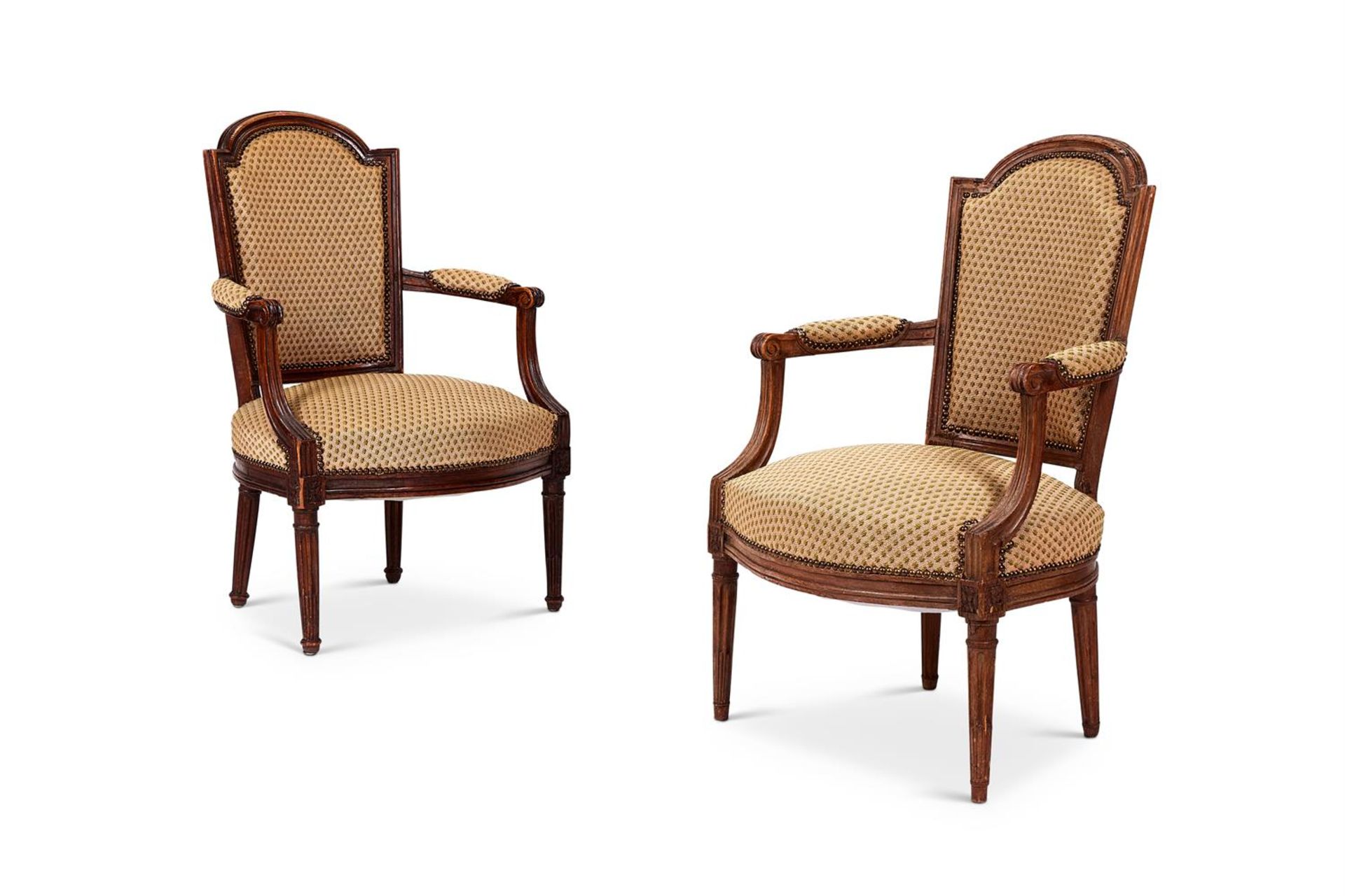 A MATCHED PAIR OF FRENCH WALNUT FAUTEUILS, 19TH CENTURY