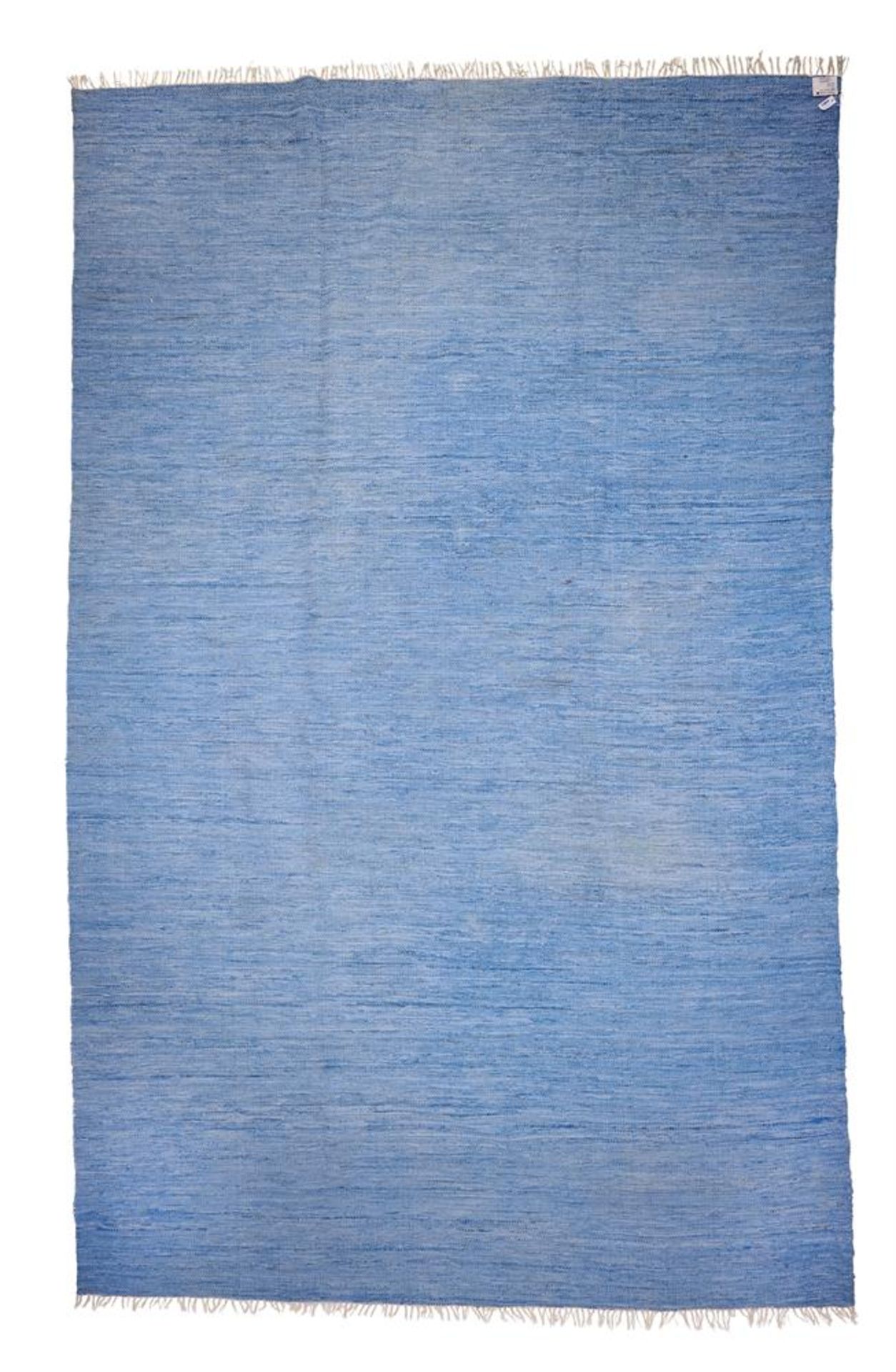 A BLUE GROUND 'RAG' RUG BY SHYAM AHUJA