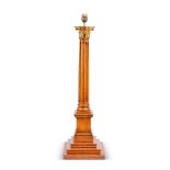 AN OAK TABLE LAMP IN THE FORM OF A CORINTHIAN COLUMN, MODERN