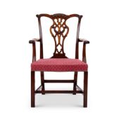 A GEORGE III STYLE MAHOGANY ARMCHAIR