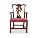 A GEORGE III STYLE MAHOGANY ARMCHAIR