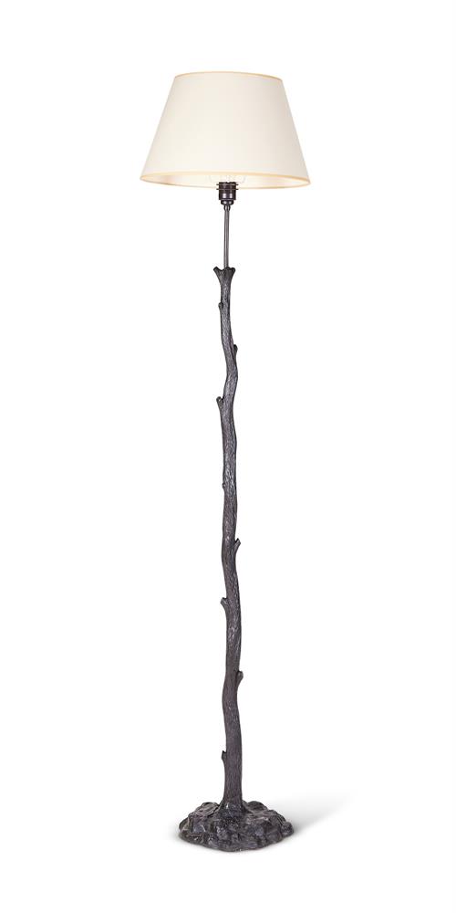 A PATINATED METAL STANDARD LAMP IN THE MANNER OF GIACOMETTI, MODERN