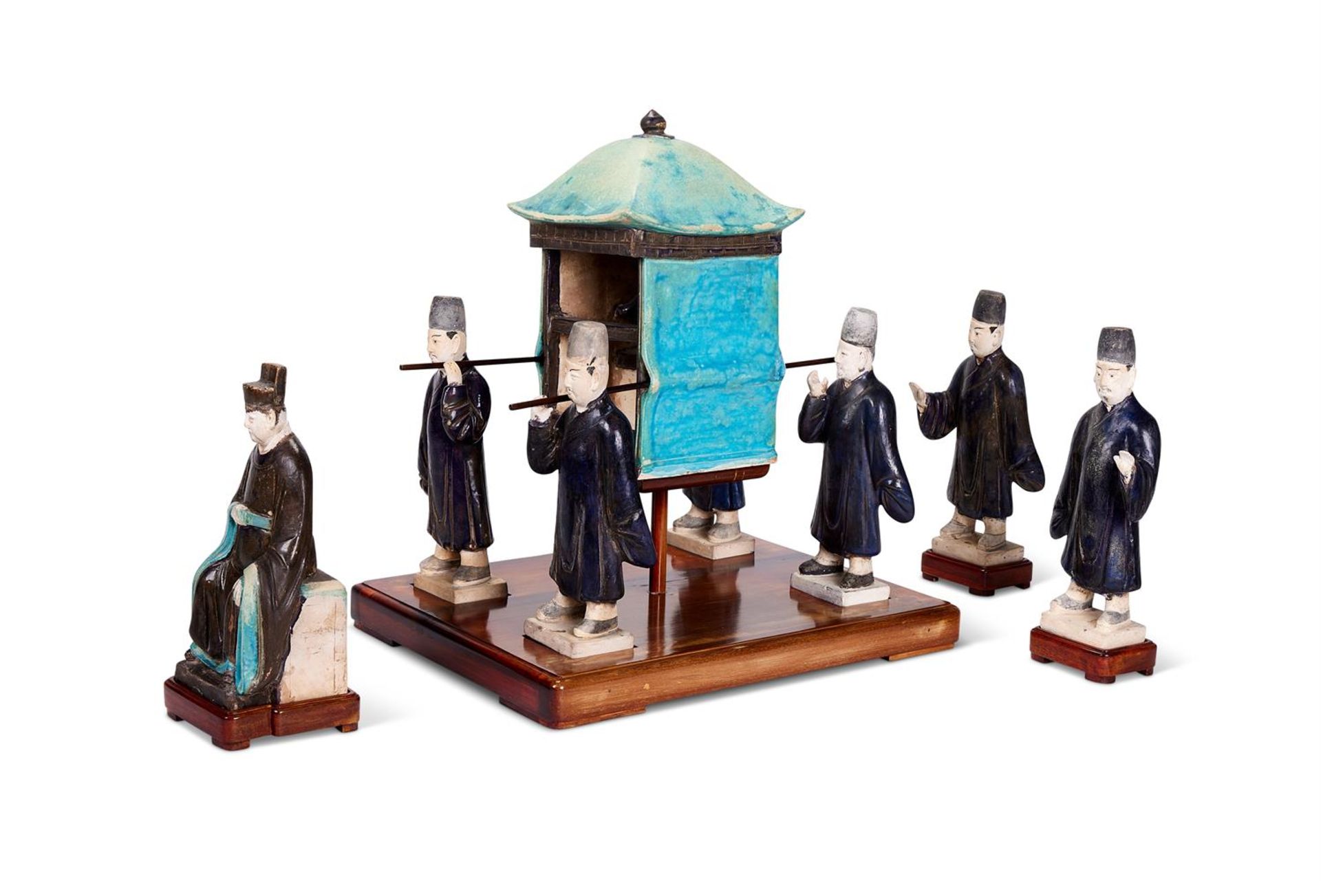 A CHINESE SANCAI GLAZED MODEL OF A SEDAN CHAIR AND ATTENDANT FIGURES, MING DYNASTY