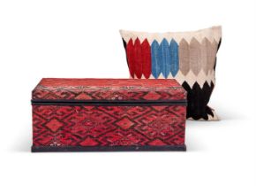 A KILIM COVERED COFFER, 20TH CENTURY AND LATER