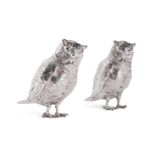 A PAIR OF GERMAN SILVER COLOURED OWL PEPPERETTES