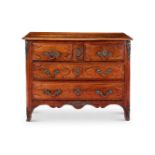 A PROVINCIAL FRENCH WALNUT COMMODE, 18TH CENTURY AND LATER