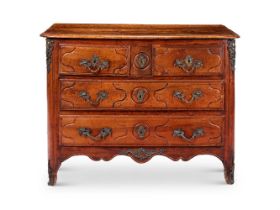 A PROVINCIAL FRENCH WALNUT COMMODE, 18TH CENTURY AND LATER