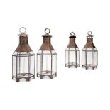 A GROUP OF FOUR NORTH AFRICAN SHEET BRASS AND GLAZED HEXAGONAL SECTION LANTERNS, MODERN